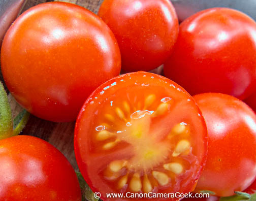 Macro photo of split cherry tomato