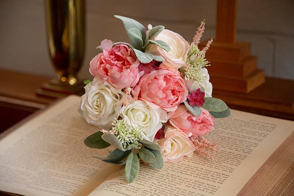 Wedding flowers with bible
