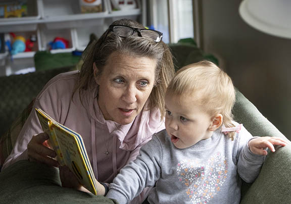 Candid photo of grandmom and grand daughter