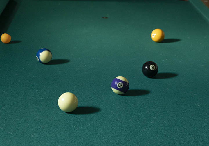 billiards table in dim light