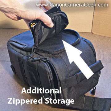 Zippered storage area on back of camera bag